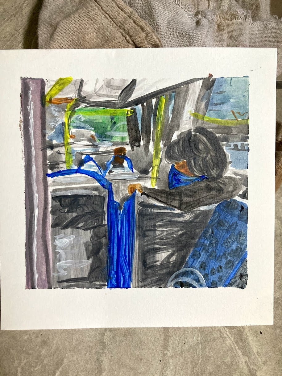 Stranger on the bus reading his book